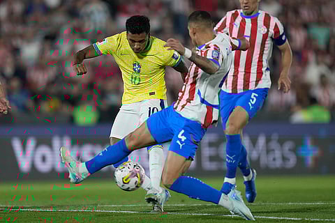 2026 FIFA World Cup Qualifying, Brazil vs Paraguay: Brazil's Rodrygo, left, and Paraguay's Juan Caceres battle for the ball